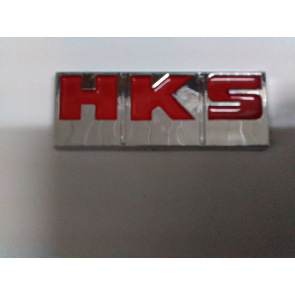 Шильдик HKS красный 6.7x2,9см