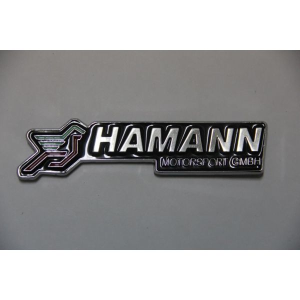 Шильдик HAMANN металл 11см-1.8см