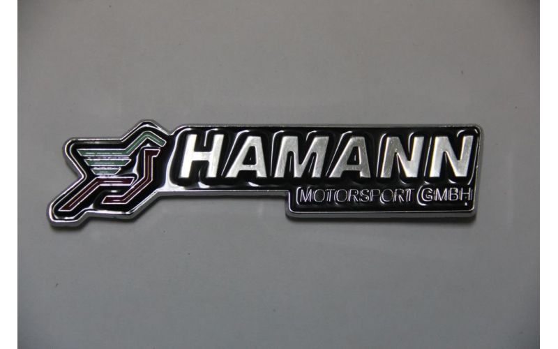 Шильдик HAMANN металл 11см-1.8см