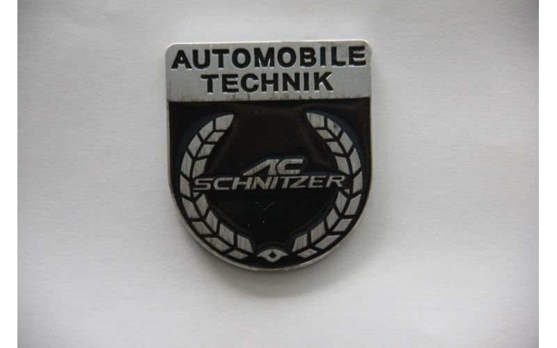 Шильдик SCHNITZER металл  5.5см-6.5см